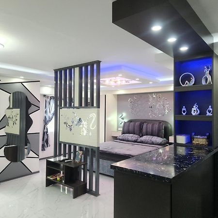Condo Azur Suites B316 Near Airport, Netflix, Stylish, Cozy With Swimming Pool ماكتان المظهر الخارجي الصورة